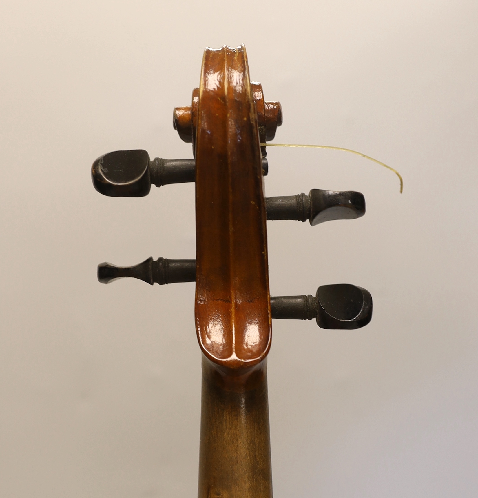 A three quarter size German violin, in case violin 56cm long